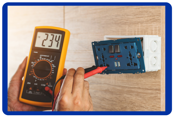 image of an electrical outlet and a person testing it with a yellow device